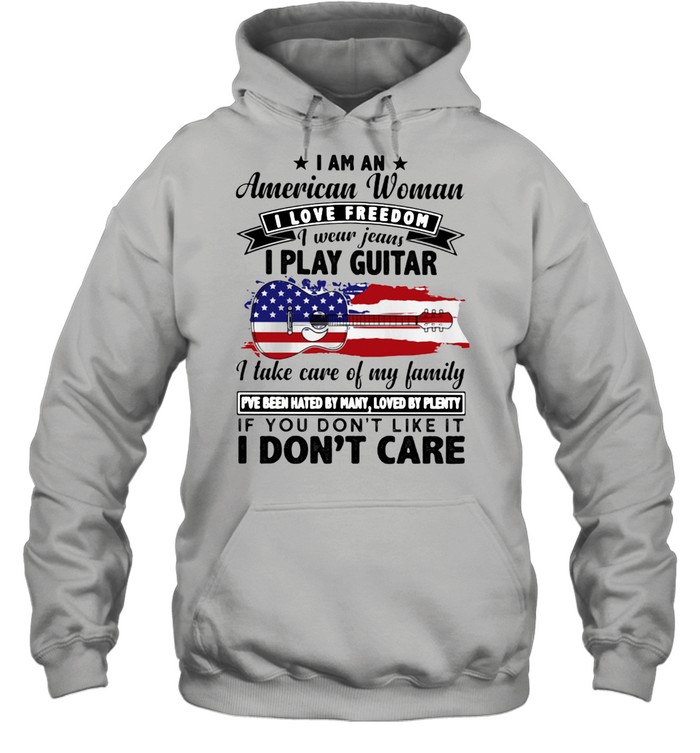 I Am An American Woman I Love Freedom I Wear Jeans I Play Guitar American Flag  Unisex Hoodie